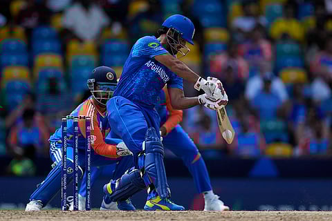 Najibullah Zadran plays a shot against India